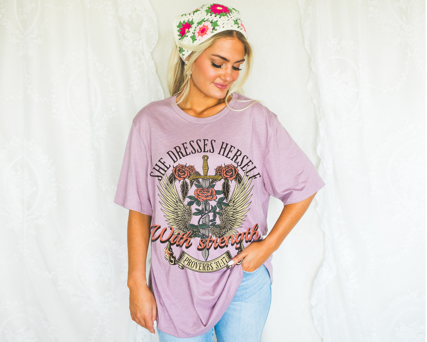 she dresses herself with strength